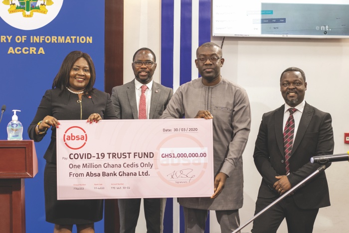 Officials of Absa Bank Ghana making the presentation to the COVID19 Fund