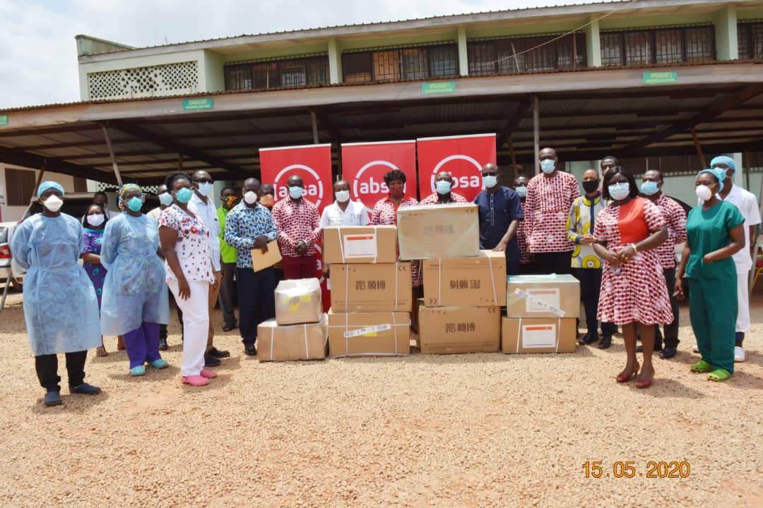 Officials of Absa Bank and Genser Energy donating medical supplies to the Kumasi South Hospital