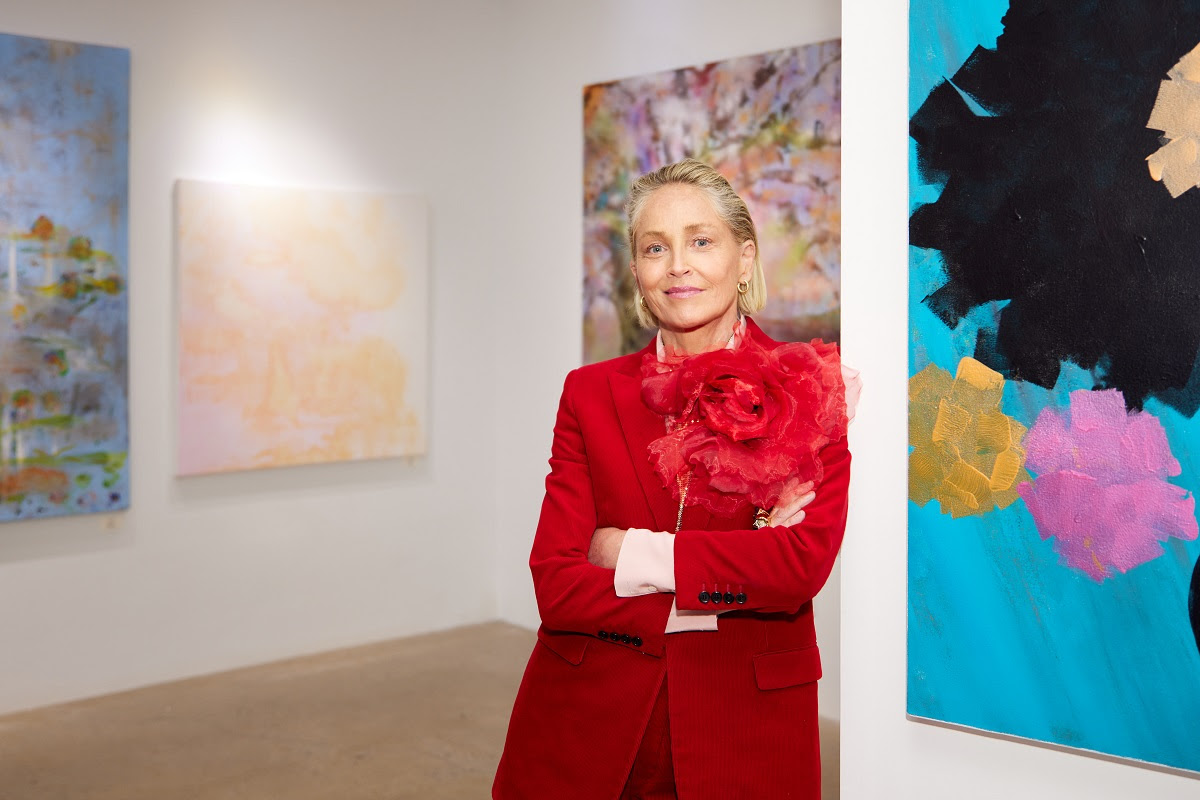 Sharon Stone with her paintings at the East Coast premiere of her art exhibition.