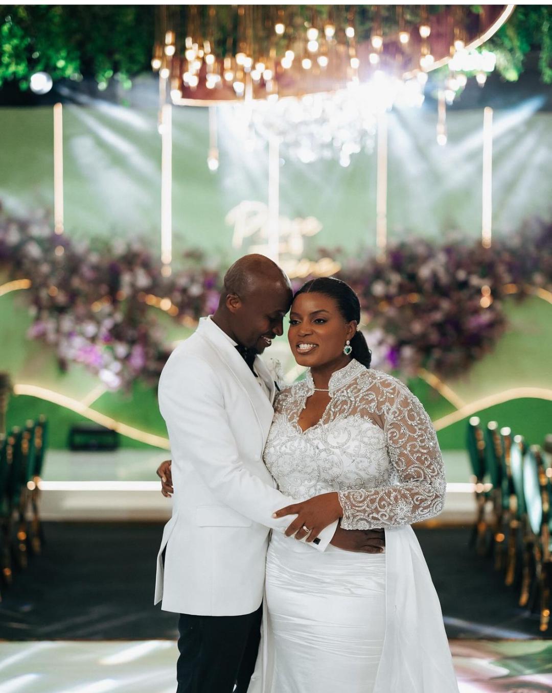 Irene Logan sings 'At Last' as she dances with her husband at their wedding reception